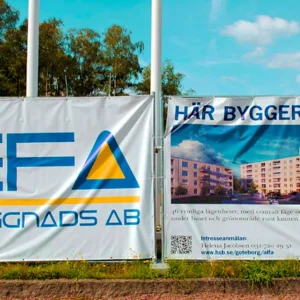 Mainosbanneri Työmaa-aita-aidalle
